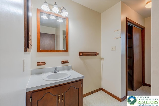 4834 Maple St, Lower Mt Bethel Twp, PA 18013 - bathroom with vanity and baseboards