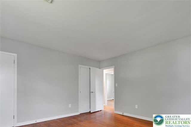 217 2nd St, Walnutport Boro, PA 18088 - unfurnished room with wood finished floors and baseboards