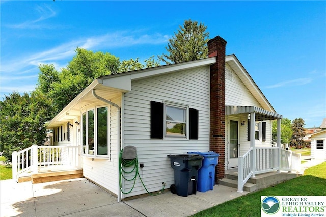 217 2nd St, Walnutport Boro, PA 18088 - view of side of home with a chimney