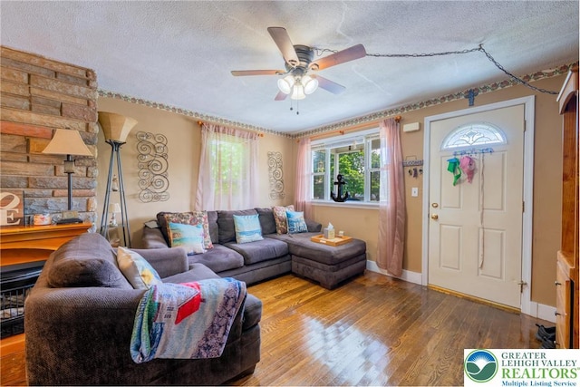801 Karoly St, Freemansburg Boro, PA 18017 - living room featuring a textured ceiling, hardwood / wood-style flooring, and ceiling fan