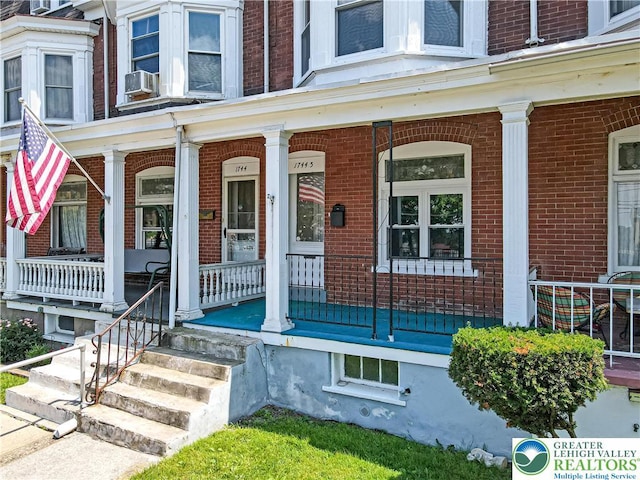 1744 W Chew St, Allentown City, PA 18104 - doorway to property featuring brick siding and a porch