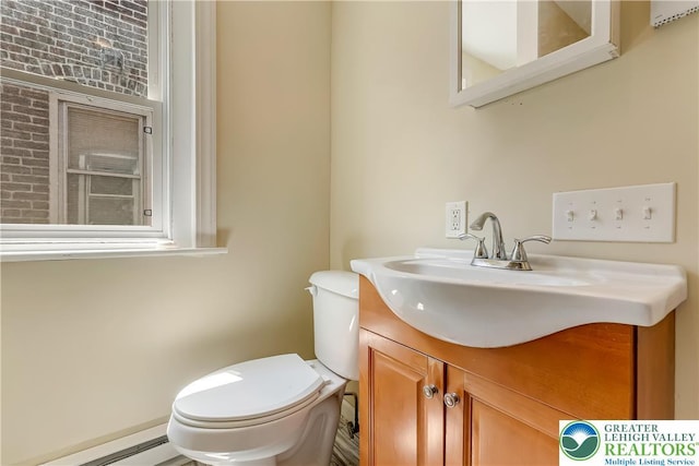 1744 W Chew St, Allentown City, PA 18104 - bathroom featuring baseboard heating and vanity