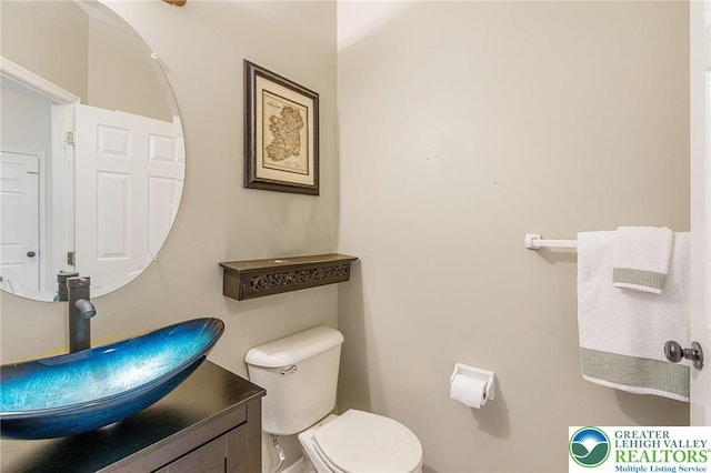 441 Sawgrass Dr, Upper Macungie Twp, PA 18104 - bathroom featuring vanity and toilet