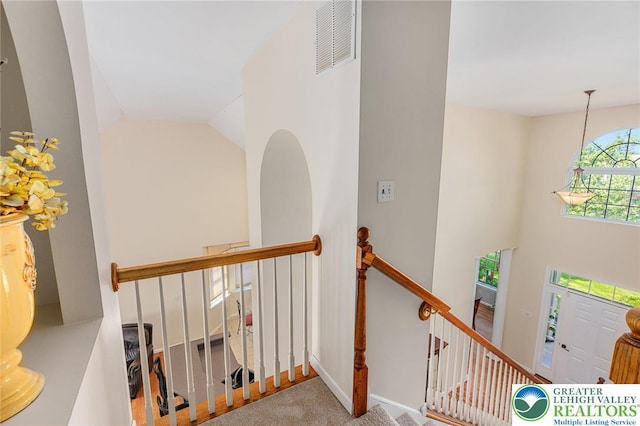 441 Sawgrass Dr, Upper Macungie Twp, PA 18104 - stairs featuring high vaulted ceiling and baseboards
