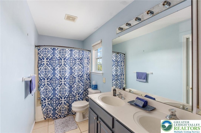 441 Sawgrass Dr, Upper Macungie Twp, PA 18104 - full bath featuring double vanity, tile patterned flooring, and shower / bathtub combination with curtain