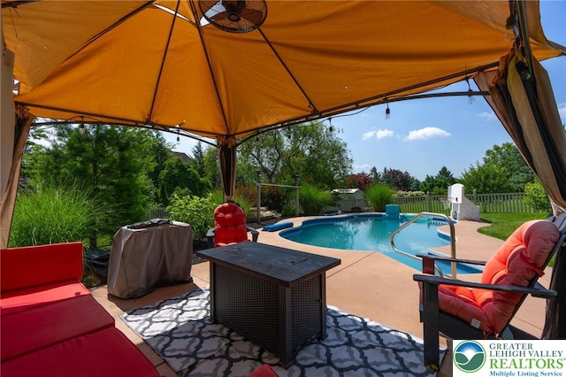 441 Sawgrass Dr, Upper Macungie Twp, PA 18104 - view of pool featuring a fenced backyard, a patio, a gazebo, and grilling area