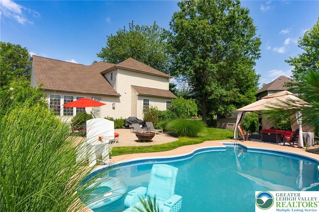 441 Sawgrass Dr, Upper Macungie Twp, PA 18104 - swimming pool with a patio area, a gazebo, and a fire pit