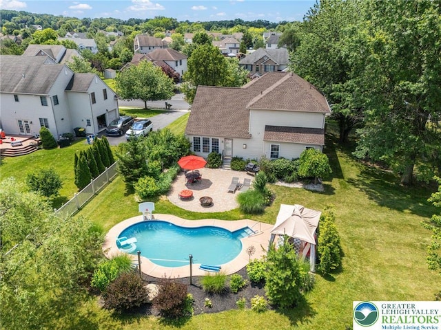 441 Sawgrass Dr, Upper Macungie Twp, PA 18104 - view of pool with an outdoor fire pit, a patio area, a fenced backyard, a water slide, and french doors
