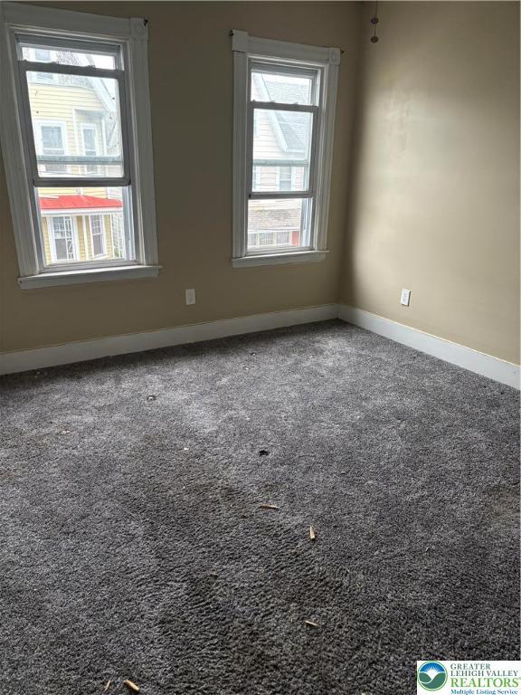 232 W Nesquehoning St, Easton, PA 18042 - empty room with baseboards and carpet floors