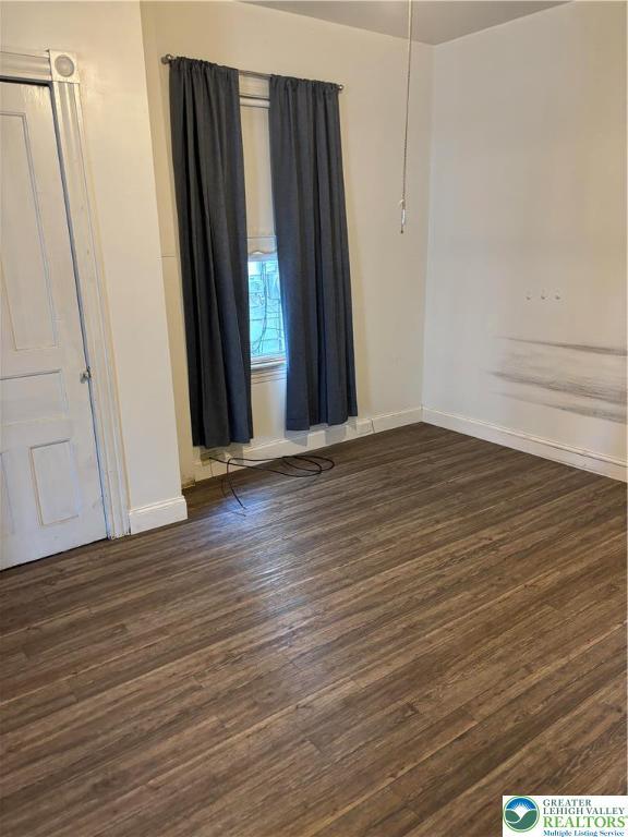 232 W Nesquehoning St, Easton, PA 18042 - spare room featuring dark wood-style flooring
