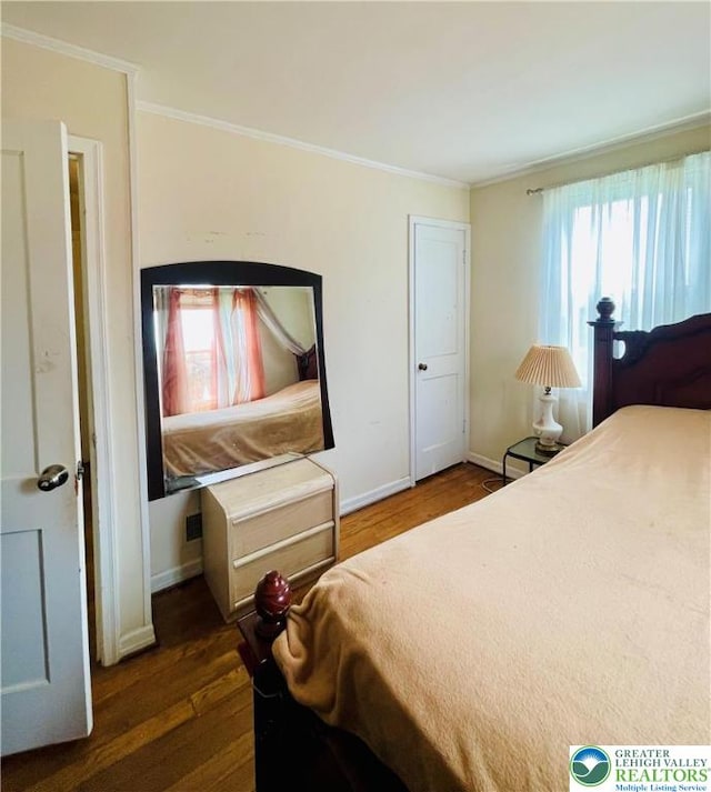 95 7th St, Whitehall Twp, PA 18052 - bedroom with crown molding and wood finished floors