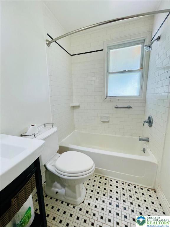 95 7th St, Whitehall Twp, PA 18052 - bathroom featuring bathing tub / shower combination and vanity