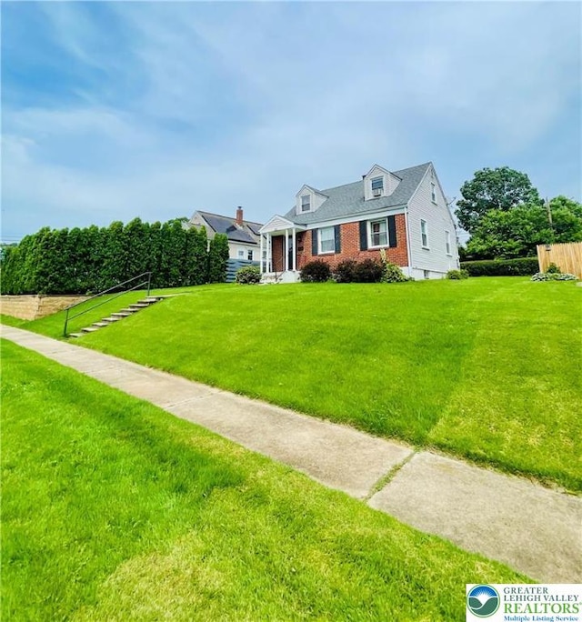 95 7th St, Whitehall Twp, PA 18052 - cape cod-style house featuring brick siding