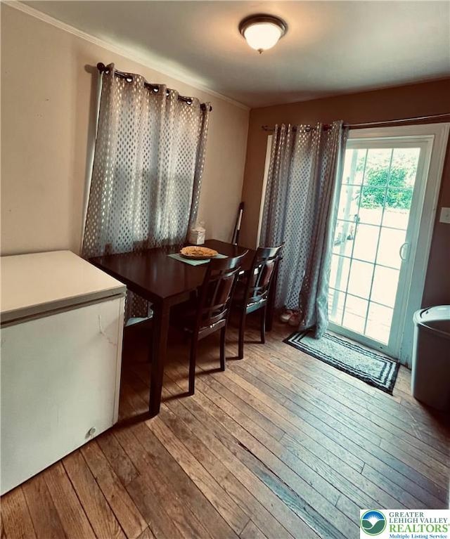 95 7th St, Whitehall Twp, PA 18052 - dining area featuring hardwood / wood-style floors and ornamental molding