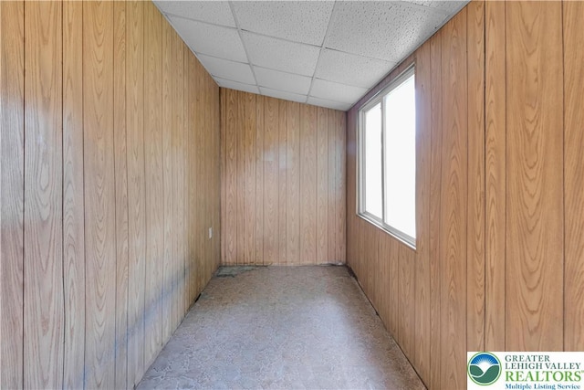 232 W Patterson St, Lansford Boro, PA 18232 - spare room featuring a drop ceiling and wooden walls