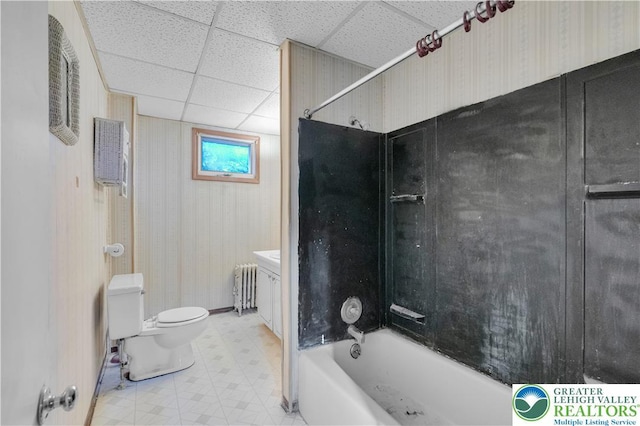 232 W Patterson St, Lansford Boro, PA 18232 - bathroom with radiator heating unit, tile patterned floors, bathtub / shower combination, and a drop ceiling