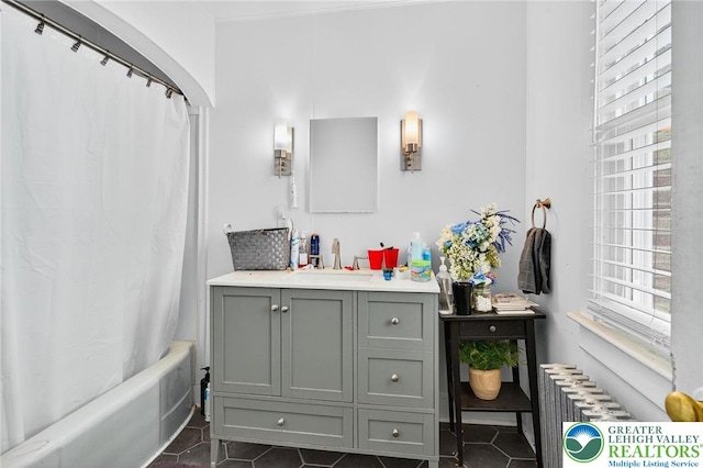 10 S Broad St, Bangor Boro, PA 18013 - bathroom with vanity, healthy amount of natural light, shower / bath combo with shower curtain, and tile patterned floors