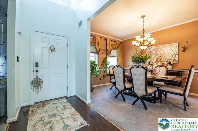 6 Westridge Ct, Middle Smithfield Twp, PA 18302 - foyer entrance featuring ornamental molding, a chandelier, and dark wood-type flooring