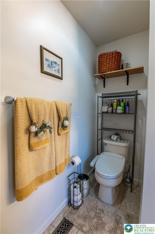 6 Westridge Ct, Middle Smithfield Twp, PA 18302 - bathroom featuring toilet and tile patterned floors