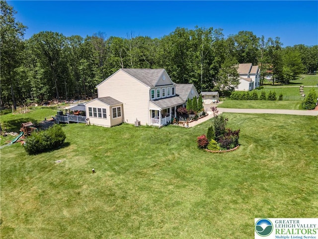 6 Westridge Ct, Middle Smithfield Twp, PA 18302 - view of front of house with a front yard and a forest view
