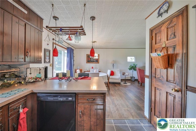 70 Faust N Rd, Pa, PA 19507 - kitchen with black dishwasher, a peninsula, plenty of natural light, and light countertops