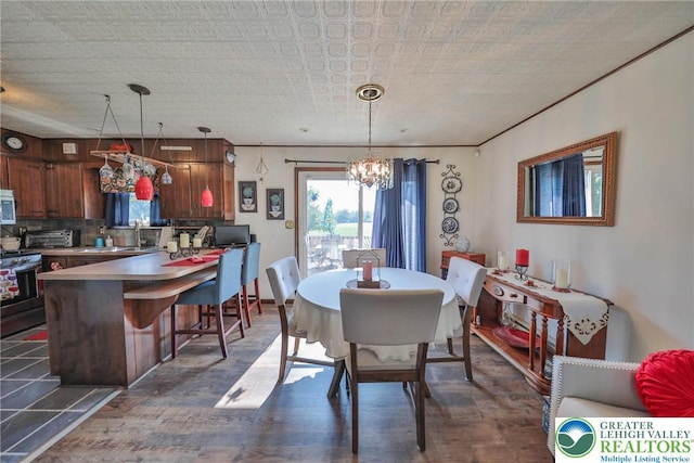 70 Faust N Rd, Pa, PA 19507 - dining room with dark wood-style floors and a chandelier