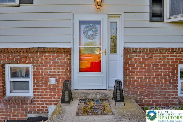 70 Faust N Rd, Pa, PA 19507 - doorway to property featuring brick siding
