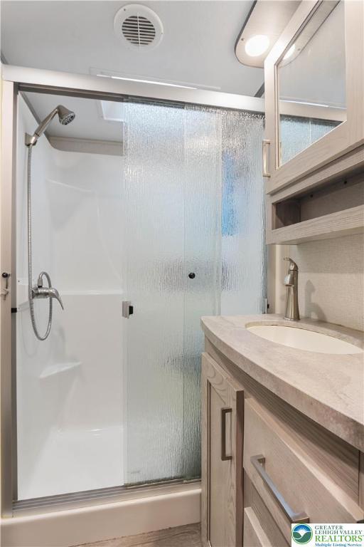 149 Deer Path Ln, Tobyhanna Twp, PA 18346 - full bathroom with a shower stall and vanity