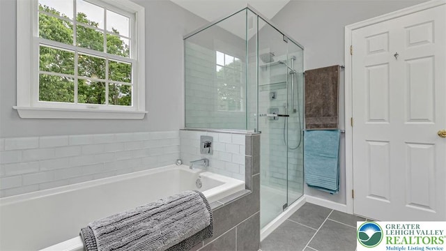310 Spyglass Hill Rd, Bath Boro, PA 18014 - full bath featuring a shower stall, tile patterned floors, and a garden tub