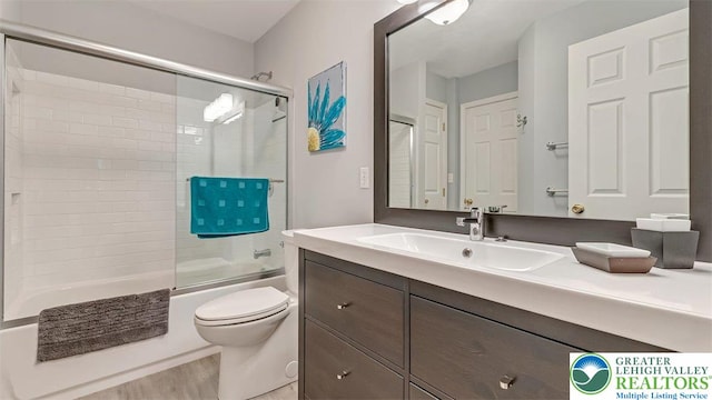 310 Spyglass Hill Rd, Bath Boro, PA 18014 - full bath featuring vanity, combined bath / shower with glass door, and wood finished floors