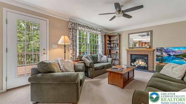 310 Spyglass Hill Rd, Bath Boro, PA 18014 - living area featuring ceiling fan, crown molding, light colored carpet, and a brick fireplace