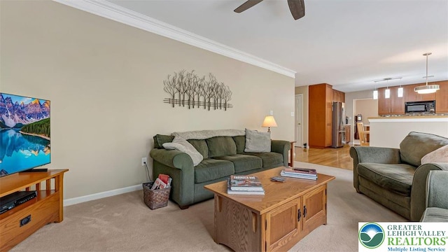 310 Spyglass Hill Rd, Bath Boro, PA 18014 - living area featuring a ceiling fan, light carpet, and ornamental molding