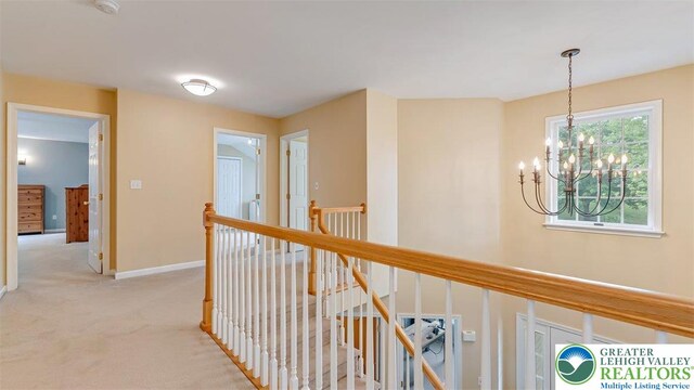 310 Spyglass Hill Rd, Bath Boro, PA 18014 - corridor featuring an upstairs landing, a chandelier, and carpet