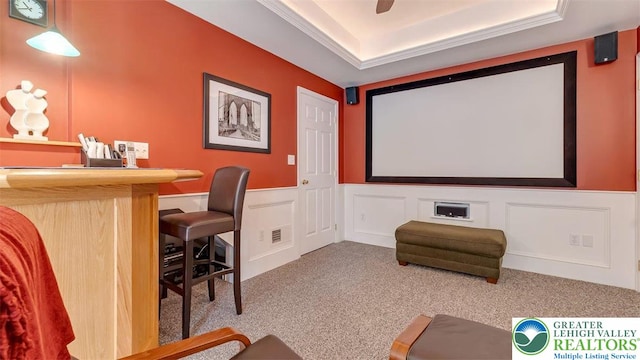310 Spyglass Hill Rd, Bath Boro, PA 18014 - carpeted home theater with a decorative wall, a wainscoted wall, a dry bar, and a tray ceiling