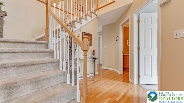 310 Spyglass Hill Rd, Bath Boro, PA 18014 - staircase with wood finished floors and a towering ceiling