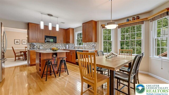 310 Spyglass Hill Rd, Bath Boro, PA 18014 - dining area featuring light wood-style floors and healthy amount of natural light