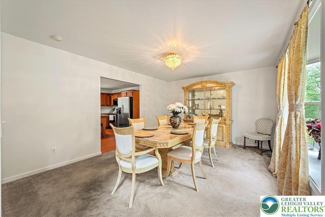 210 Swartsburo Dr, Lehman Twp, PA 18371 - dining space with light colored carpet and baseboards