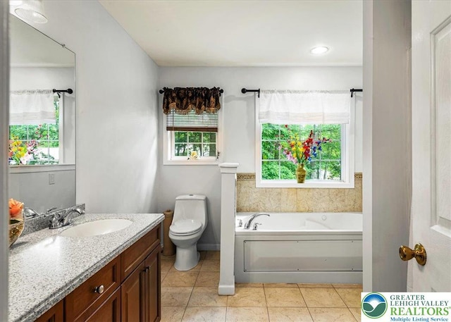 210 Swartsburo Dr, Lehman Twp, PA 18371 - bathroom with vanity, a garden tub, and tile patterned floors