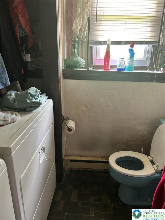 4103 Birch Dr, Bethlehem City, PA 18020 - bathroom featuring baseboard heating and washer / clothes dryer