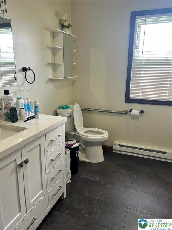 4103 Birch Dr, Bethlehem City, PA 18020 - bathroom featuring baseboard heating and vanity