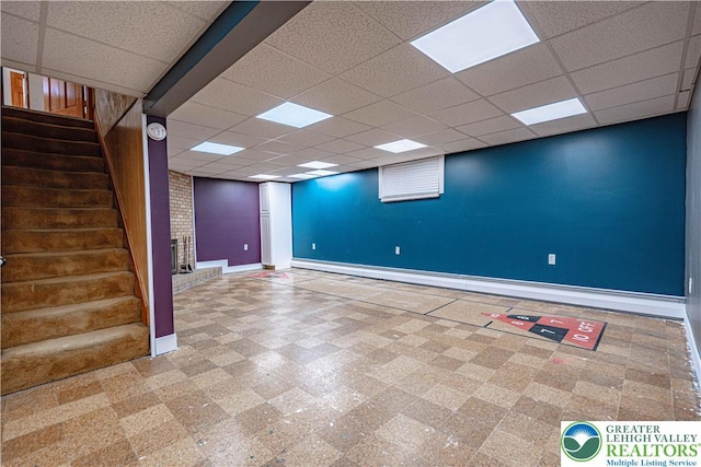 3442 Hickory Cir S, Whitehall Twp, PA 18103 - finished basement with stairway, a paneled ceiling, and a baseboard radiator