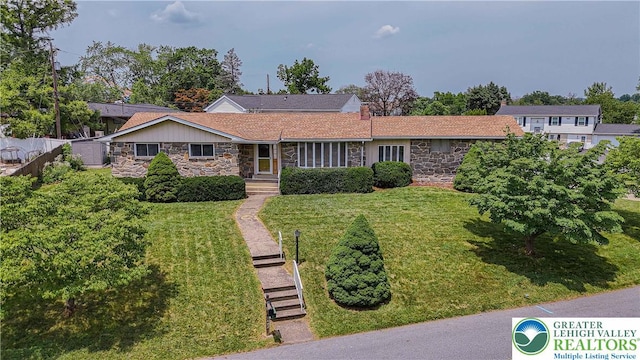 3442 Hickory Cir S, Whitehall Twp, PA 18103 - view of front of home featuring stone siding and a front lawn