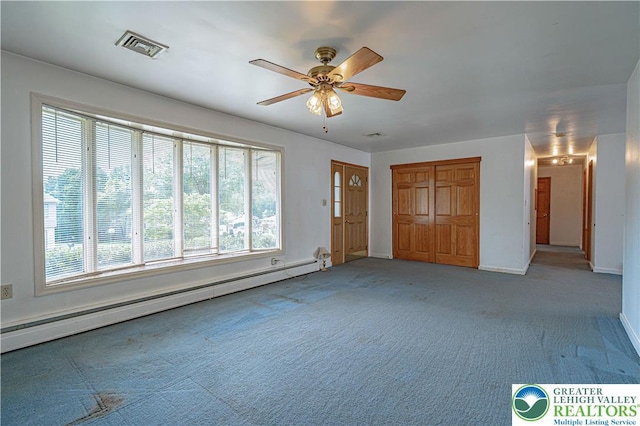 3442 Hickory Cir S, Whitehall Twp, PA 18103 - unfurnished bedroom featuring a baseboard radiator, carpet floors, and a ceiling fan