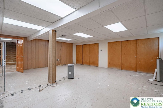 3442 Hickory Cir S, Whitehall Twp, PA 18103 - finished below grade area featuring a paneled ceiling, stairs, and wooden walls