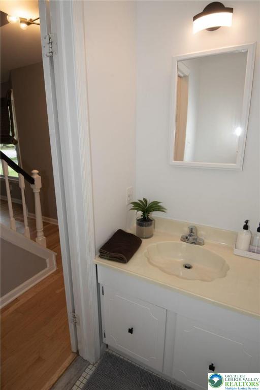 1325 Devon Cir S, Whitehall Twp, PA 18104 - bathroom featuring vanity and wood finished floors