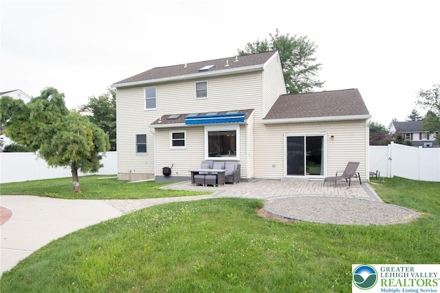 1325 Devon Cir S, Whitehall Twp, PA 18104 - back of property with a patio area, a fenced backyard, and an outdoor living space