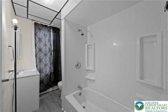 919 Lehigh St, Easton, PA 18042 - bathroom featuring vanity, wood finished floors, and shower / bath combo with shower curtain