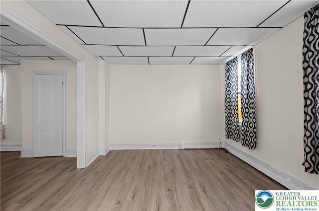 919 Lehigh St, Easton, PA 18042 - below grade area featuring wood finished floors and a drop ceiling