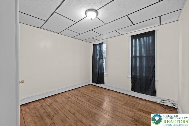 919 Lehigh St, Easton, PA 18042 - spare room featuring a drop ceiling and wood finished floors