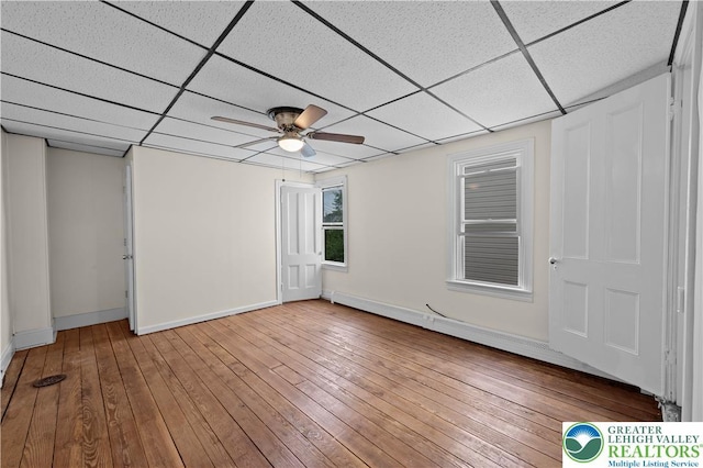 919 Lehigh St, Easton, PA 18042 - unfurnished bedroom featuring a drop ceiling, hardwood / wood-style floors, and ceiling fan